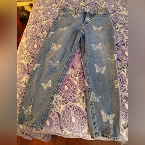 Women's jeans size 7 (28) light wash with butterflies